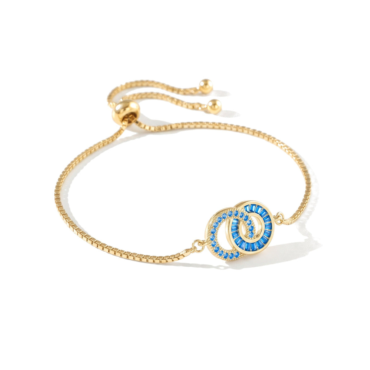Mor-dotter-armband i guld – Mamma: December (Blå zirkon), Dotter: December (Blå zirkon)