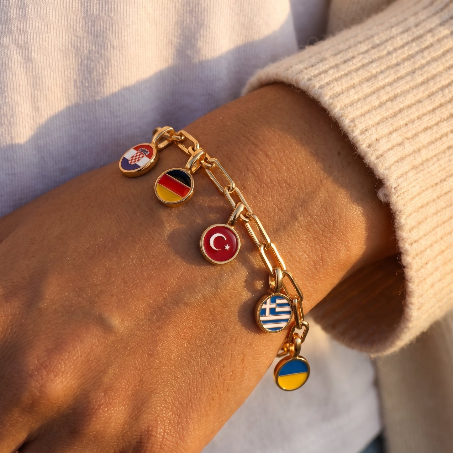 Armband med Landscharms – Guld